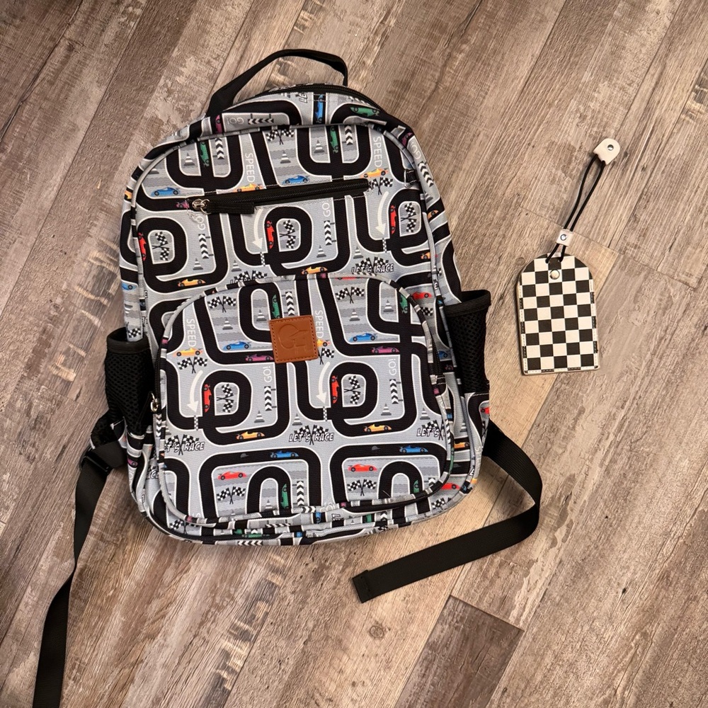 George Hats backpack and matching lunch box with a race car theme